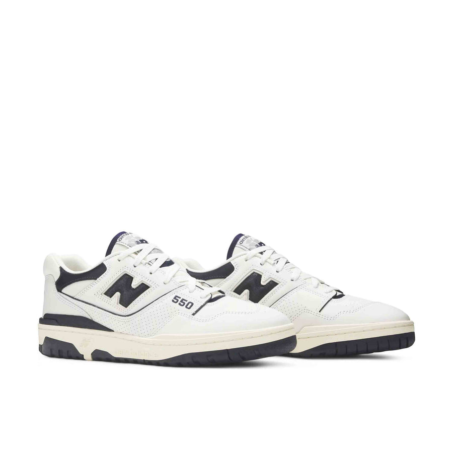 A pair of New Balance 550 Aime Leon Dore White Navy sneakers