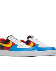 A pair of Nike Air Force 1 Low '07 QS Uno sneakers in white, black and multicolours