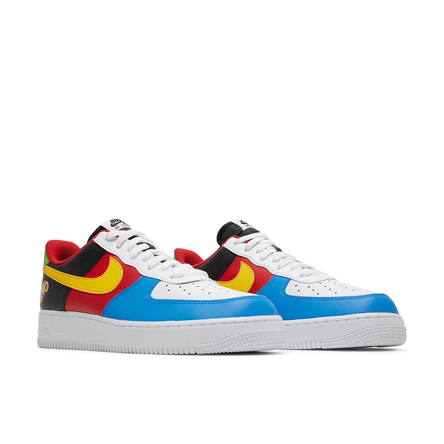 A pair of Nike Air Force 1 Low '07 QS Uno sneakers in white, black and multicolours