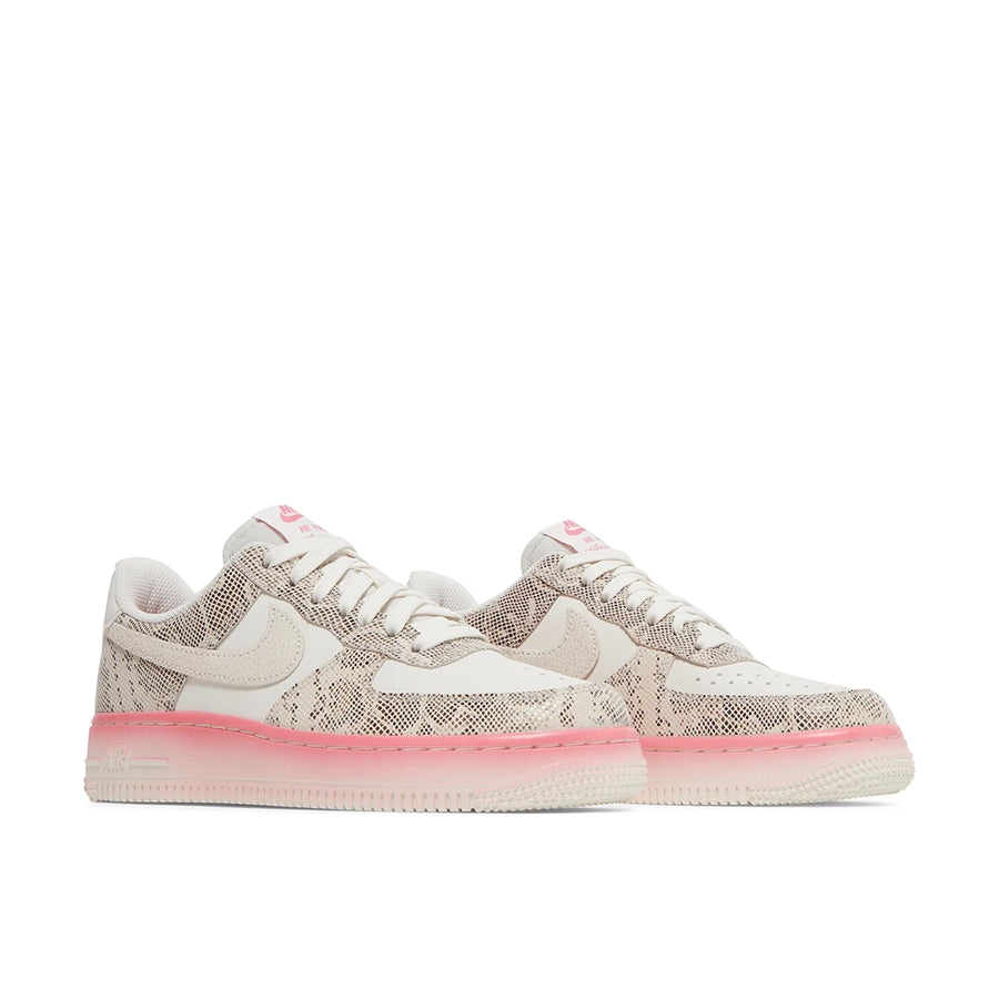 A pair of Nike Air Force 1 Low Our Force 1 Snakeskin womens sneakers