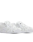 A pair of Nike Air Force 1 Low Swarovski Retroflective Crystals womens shoes in white