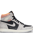 Side of Nike Air Jordan 1 basketball shoes in grey hyper crimson colour
