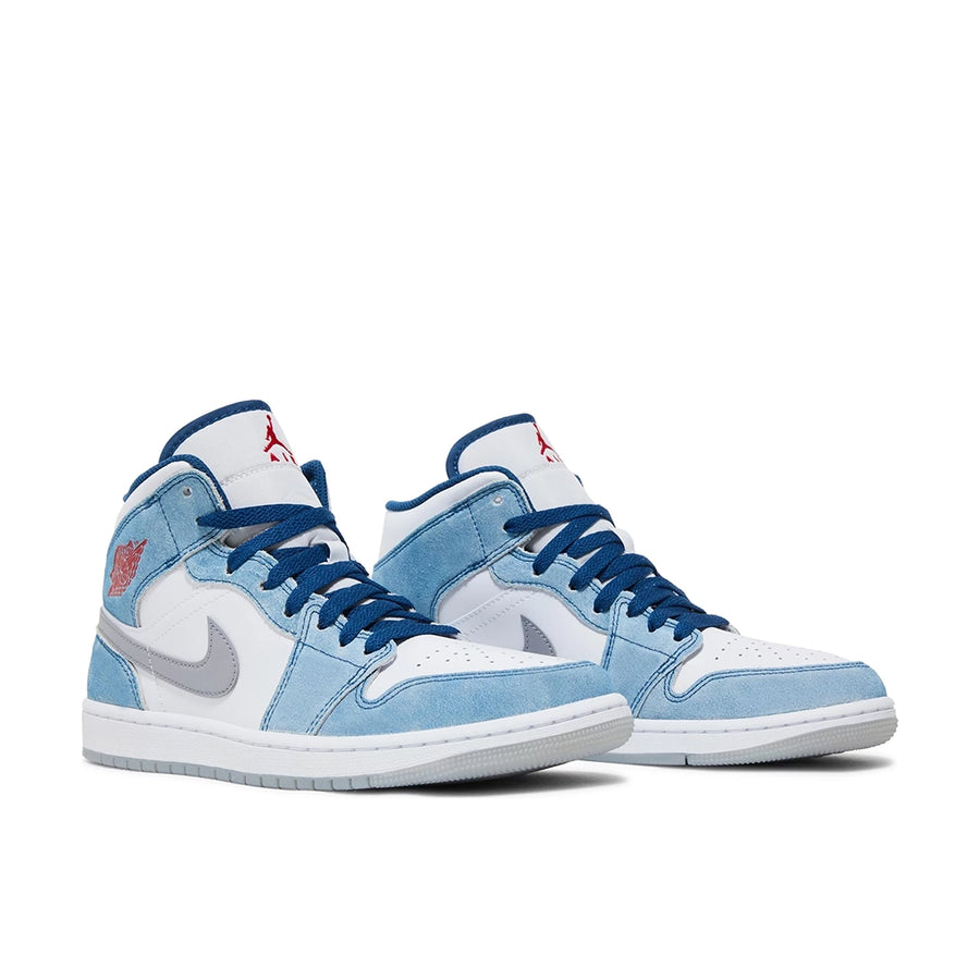 A pair of the Nike Jordan Air 1 mid basketball shoes are in a blue and fiery red colourway.