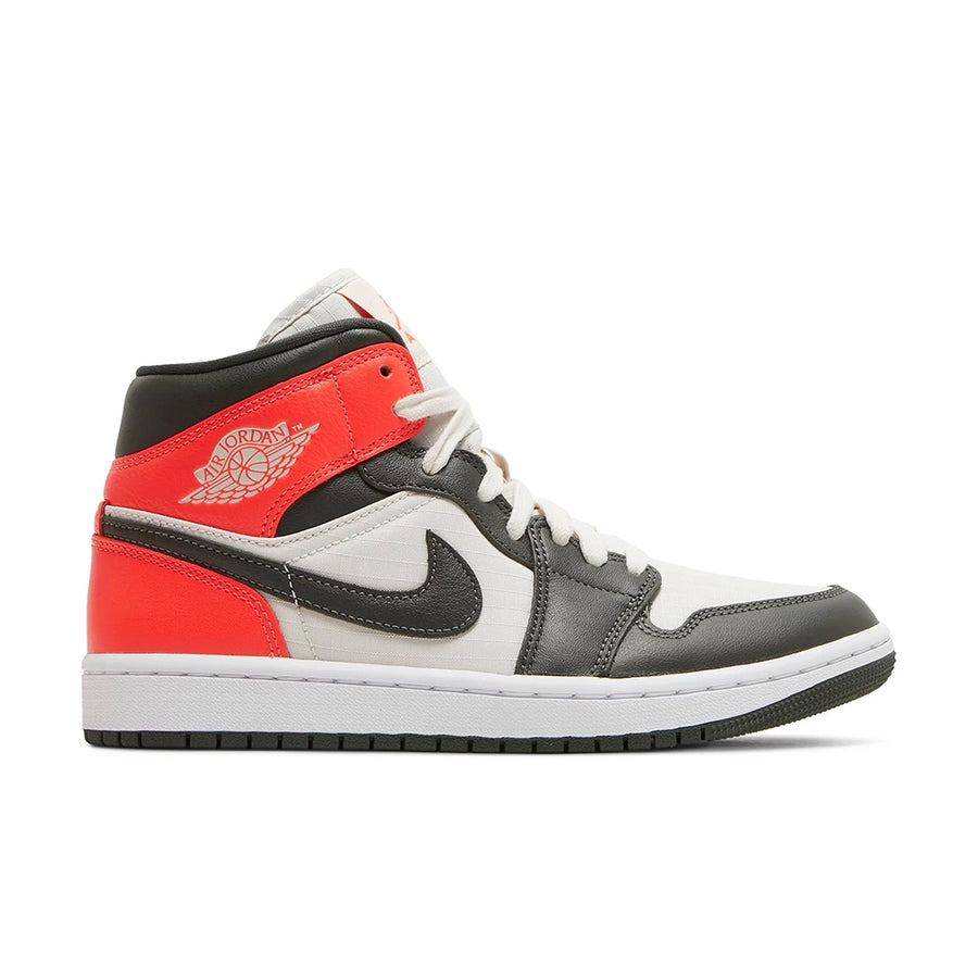Side of the Jordan 1 Mid 'light Orewood Brown' is in a black and red colourway