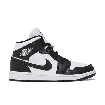 Side of the Jordan 1 Mid 'Split Black White' is in a black and white colourway
