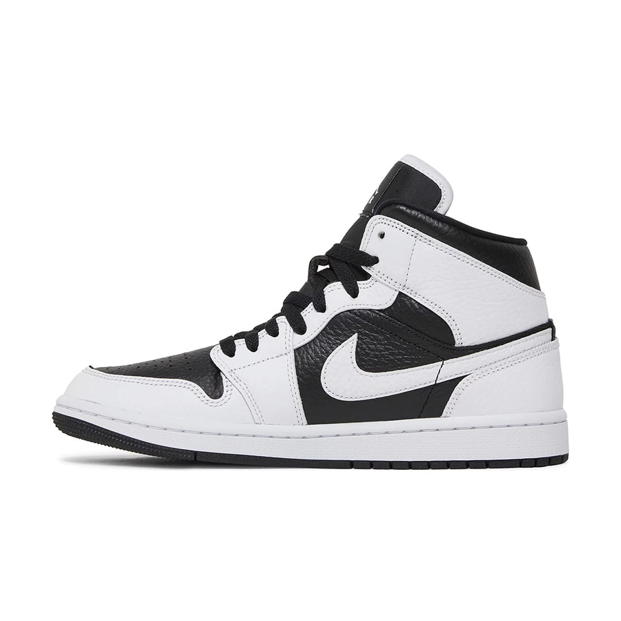 Side of the Jordan 1 Mid 'Split Black White' is in a black and white colourway