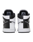 Heels of the Jordan 1 Mid 'Split Black White' is in a black and white colourway