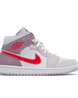 Side of the Jordan 1 Mid Valentine's Day (2022) (w) is in a pink and red colourway