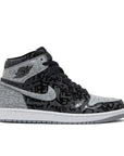 Side of Nike Air Jordan 1 basketball shoes in black grey and red rebellionaire colour