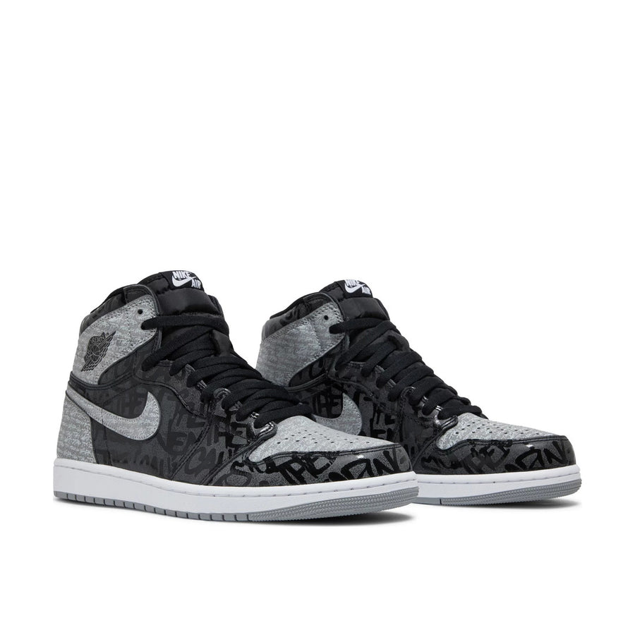 A pair of Nike Air Jordan 1 basketball shoes in black grey and red rebellionaire colour