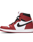Side of the Nike Air Jordan 1 High Chicago 2015 basketball shoes in black, red and white