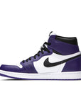 Side of the Nike Air Jordan 1 Retro High Court Purple White basketball shoes in white and purple