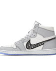 Side of the Nike Air Jordan 1 Retro High Dior sneakers in grey and white