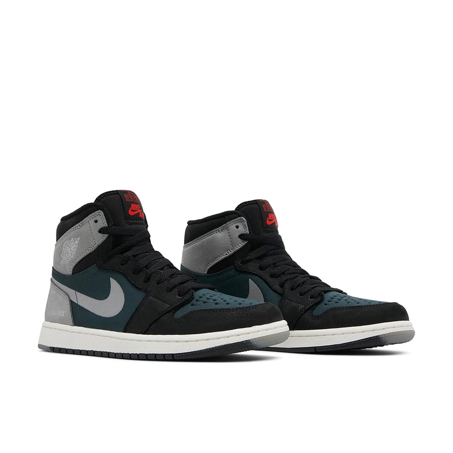 A pair of Nike Air Jordan 1 Retro High Element Gore-Tex Black Particle Grey basketball shoes in black, grey and dark green