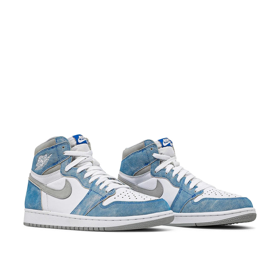 A pair of Nike Air Jordan 1 Retro High Hyper Royal Michael Jordans in white and washed out royal blue