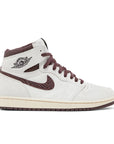Side of the Air Jordan 1 A Ma Maniere is in a cream and maroon colourway