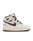 Side of the Jordan 1 High OG 'Starfish' is in a cream and maroon colourway