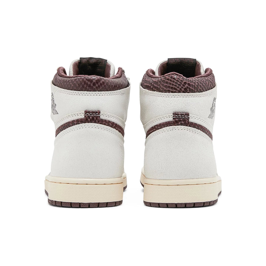Heels of the Air Jordan 1 A Ma Maniere is in a cream and maroon colourway