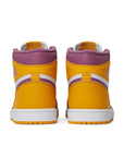 Heels of the Nike Air Jordan 1 Retro High Brotherhood basketball shoes in gold, purple and white