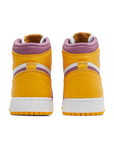 Heels of the grade school Nike Air Jordan 1 Retro High OG Brotherhood GS basketball shoes in yellow, purple and white
