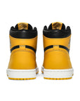 Heels of the Nike Air Jordan 1 Retro High Pollen basketball shoes in yellow and black