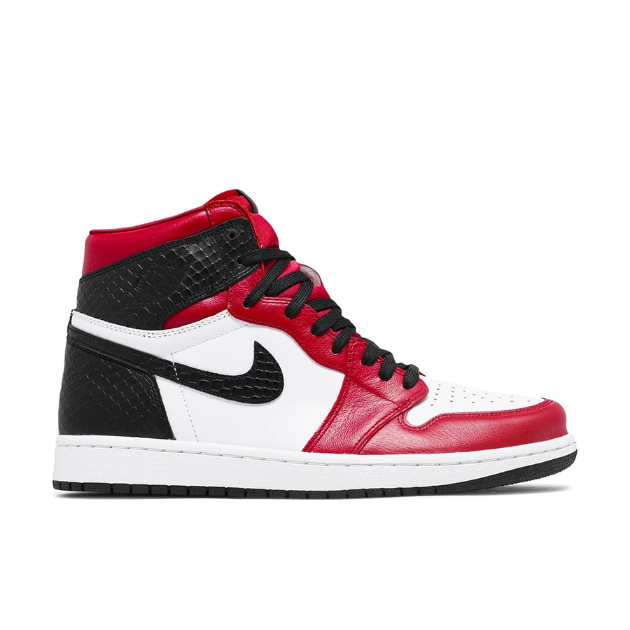 Side of the women's Nike Air Jordan 1 Retro High Satin Snake Chicago sneakers in black, red and white