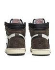 Heels of the Nike Air Jordan 1 Retro High Travis Scott basketball shoes in mocha, white and black