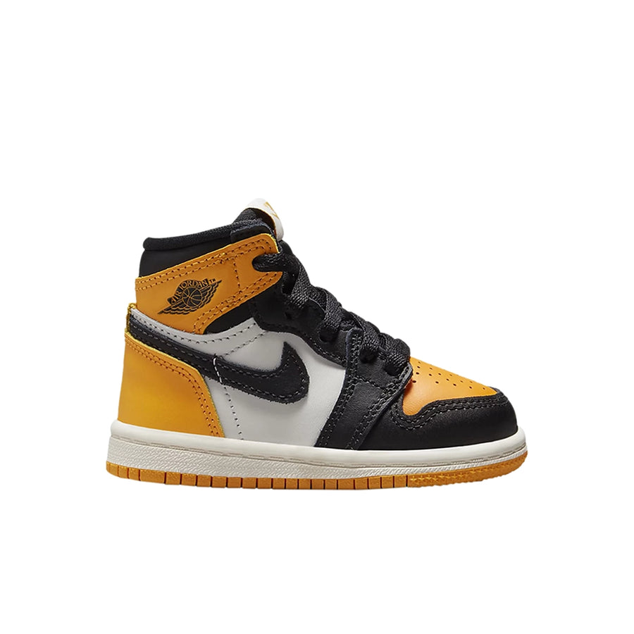 Side of the toddler Nike Air Jordan 1 Retro High Yellow Toe kids shoes in white, yellow and black