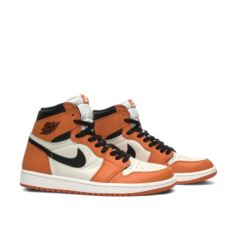A pair of Nike Air Jordan 1 Retro Reverse Shattered Backboard basketball sneakers in orange and white
