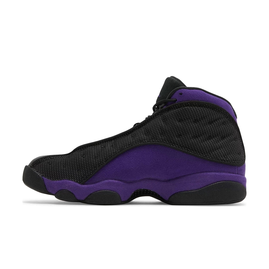 Side of Nike Jordan Air 13 basketball shoes in a black and purple colourway.