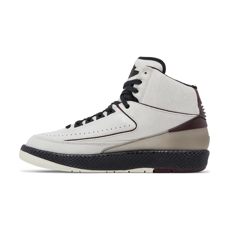 Side of the Nike Air Jordan 2 Retro A Ma Maniere sneakers in white and burgundy