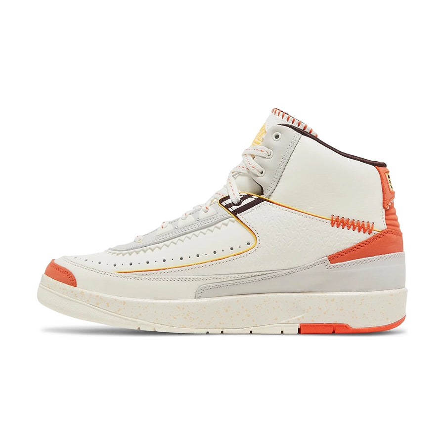 Side of the Air Jordan 2 Maison Chateau Rouge is in a  white, light grey and orange colourway