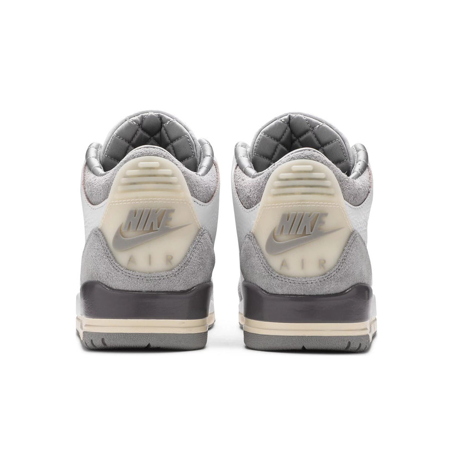 Heels of the Nike Jordan Air 3 A Ma Maniere basketball shoes in a white grey and subtle cream colour