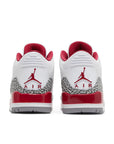 Heels of the Nike Jordan Air 3 basketball shoes in a white and cardinal red colour with an elephant print