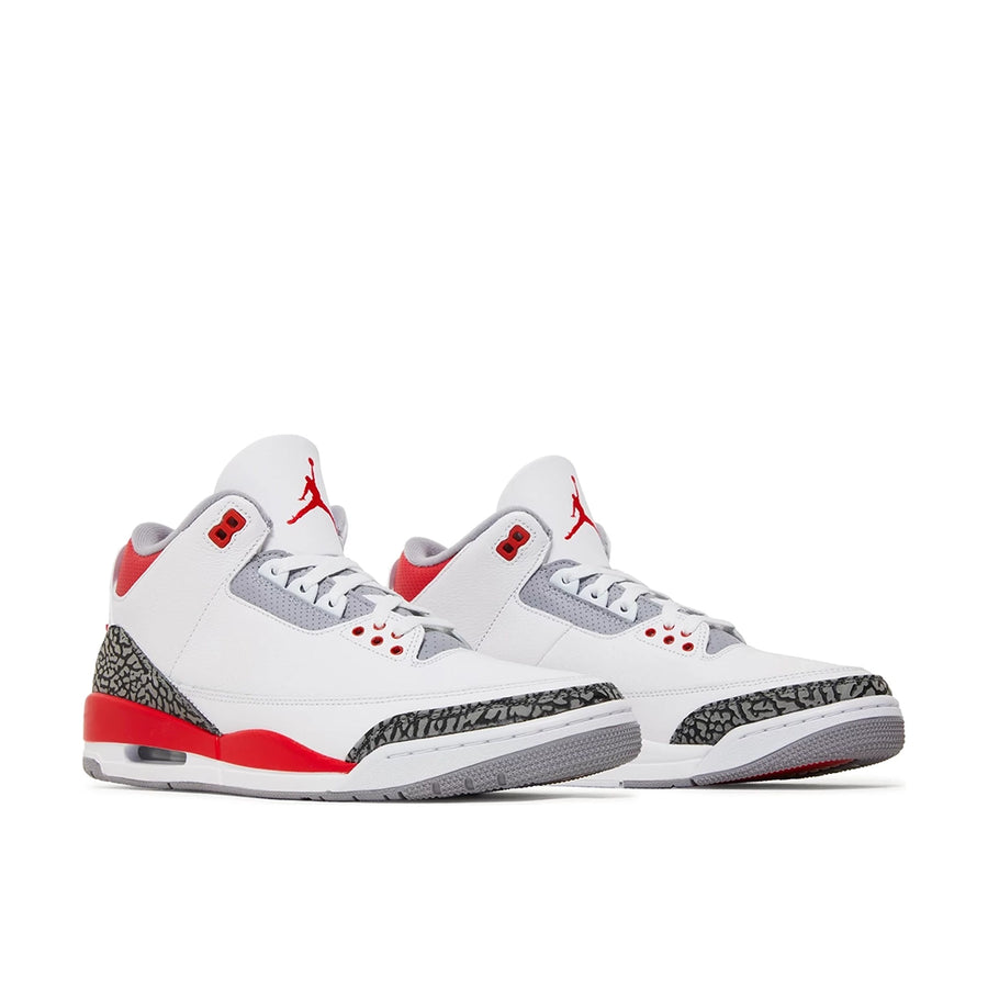 A pair of Nike Jordan Air 3 basketball shoes in a white fire red colour