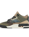 Side of Nike Jordan Air 3 basketball shoes in a patchwork camo colour