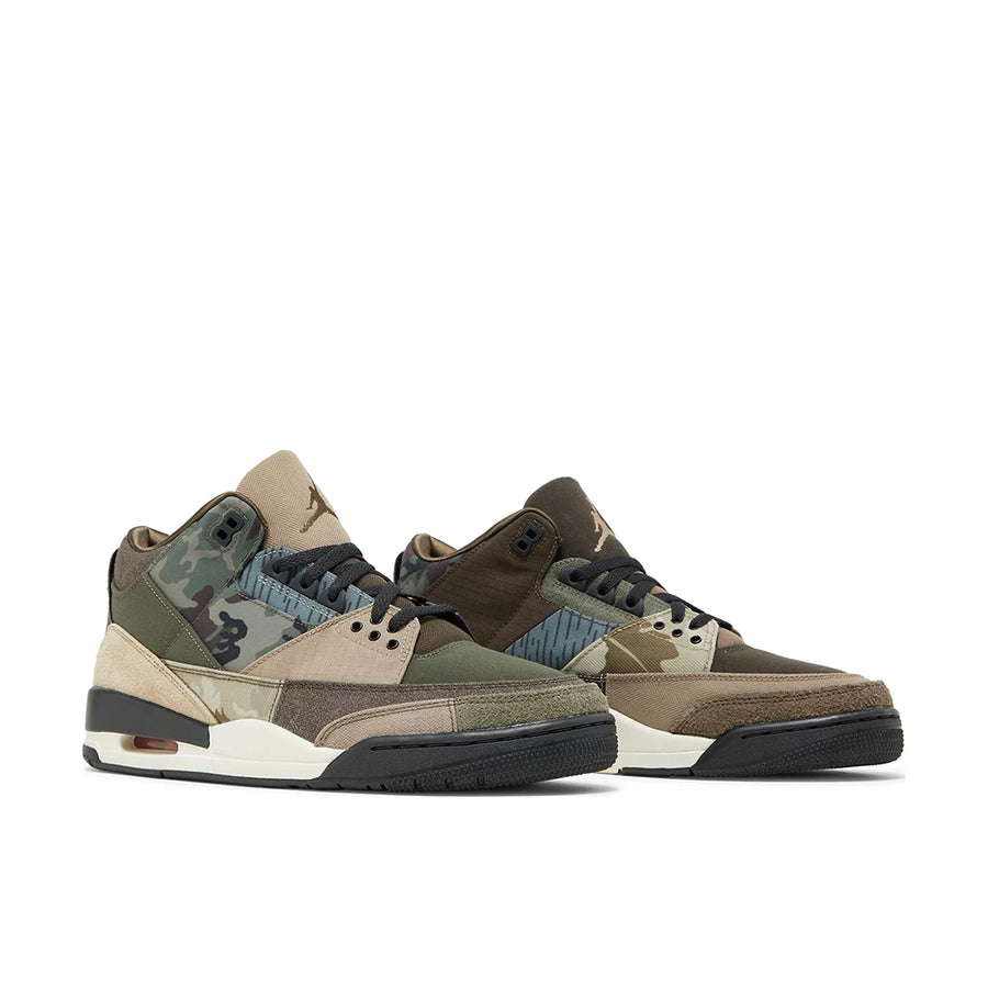 A pair of Nike Jordan Air 3 basketball shoes in a patchwork camo colour