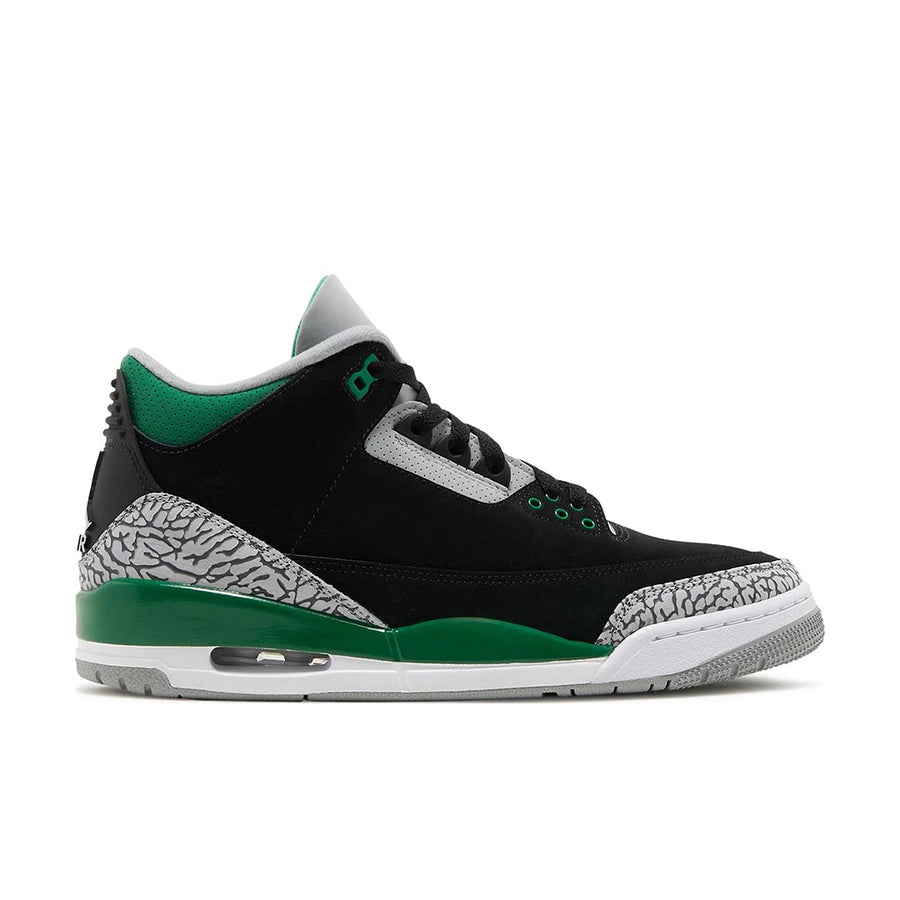 Side of Nike Jordan Air 3 basketball shoes in a black and pine green colour with an elephant print