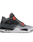 Side of Nike Air Jordan 4 retro infared basketball shoes in a  white, black and grey colourway.