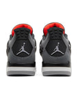 Heels of the Nike Air Jordan 4 retro infared basketball shoes in a  white, black and grey colourway.