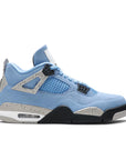 Side of the Nike Air Jordan 4 Retro University Blue basketball shoes in blue and white