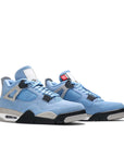 A pair of Nike Air Jordan 4 Retro University Blue basketball shoes in blue and white