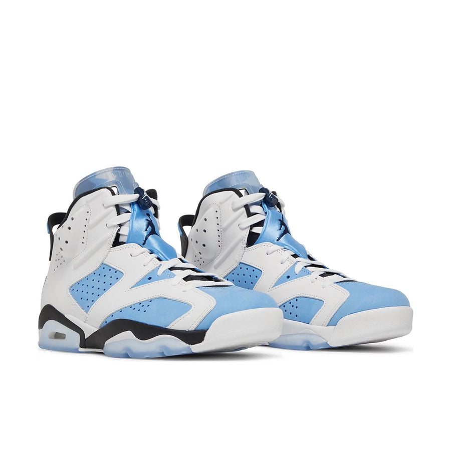 A pair of Nike Air Jordan 6 Retro UNC White basketball shoes in blue and white