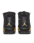 Heels of the Nike Jordan Flight Club 91 basketball shoes in black and metallic gold