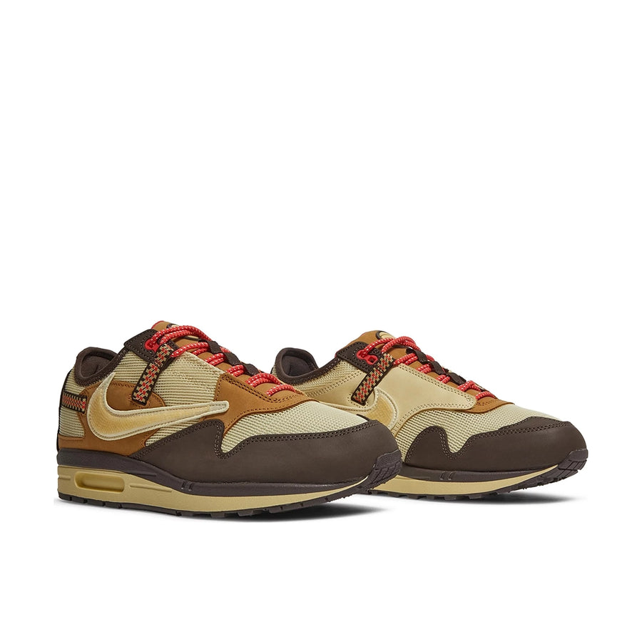 A pair of the of the Nike air max travis scott in baroque brown colour