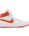 Side of the Nike Air Ship Team Orange basketaball sneakers in white and orange