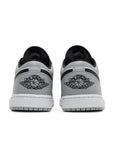 Heels of the Nike Air Jordan 1 Low Shadow Toe sneakers in grey and black