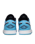 Heels of the Nike Air Jordan 1 Low UNC sneakers in white and blue