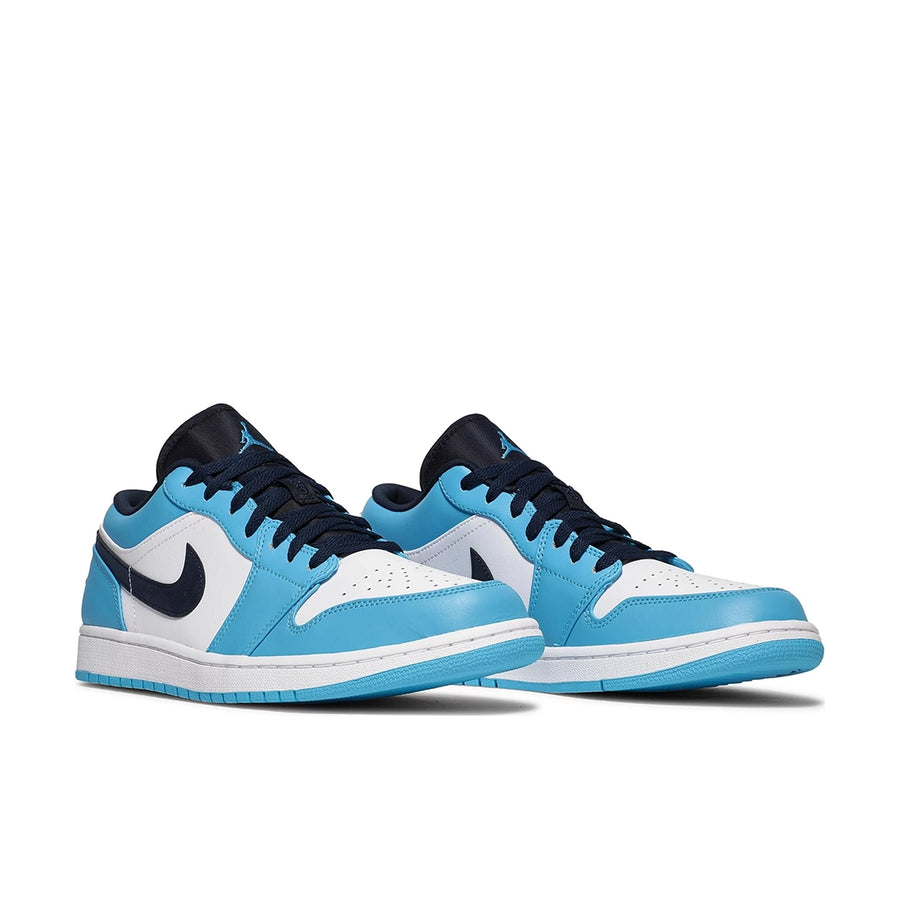 A pair of Nike Air Jordan 1 Low UNC sneakers in white and blue