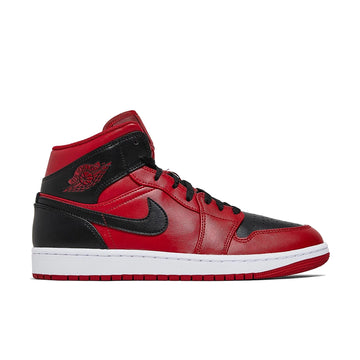 Side of Nike Air Jordan 1 Mid Reverse Bred baskteball shoes in black and red